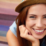 Smiling girl in hat
